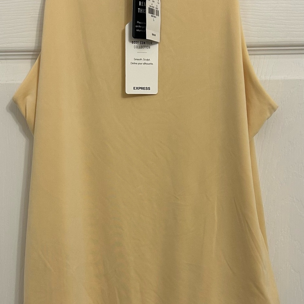 BNWT Express Women's yellow Cream bodysuit